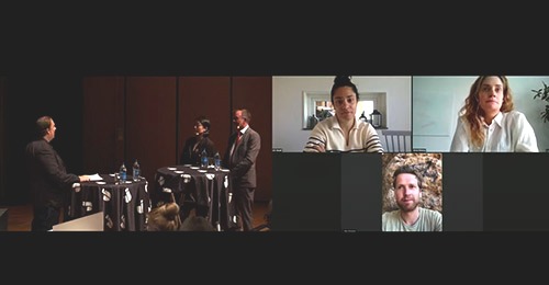 Screenshot of people in a digital meeting.